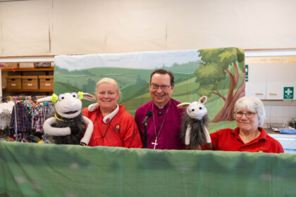 Bishop Philip Meets Baaa-bara Sheep and the Praizin’ Hands Team